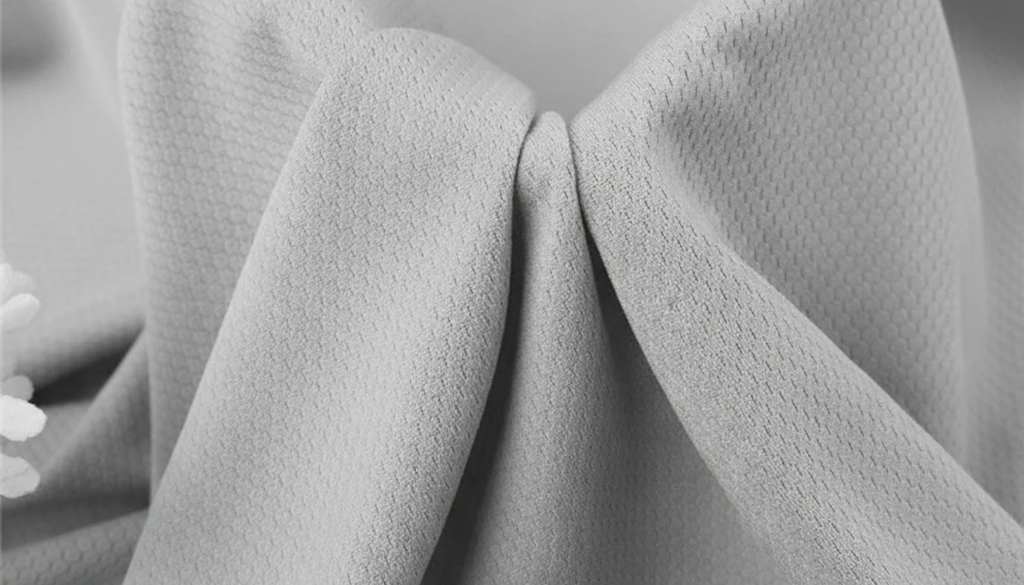 پارچه فلامنت ورزشی کندویی